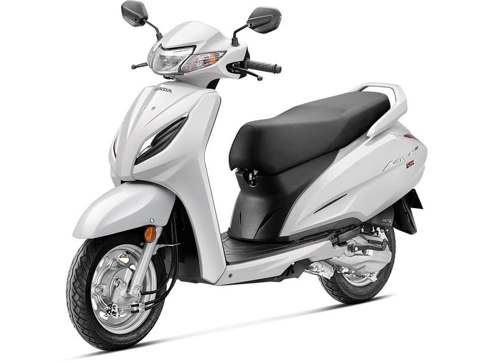 A white Honda Activa 6G scooter, three-quarter view on a white background