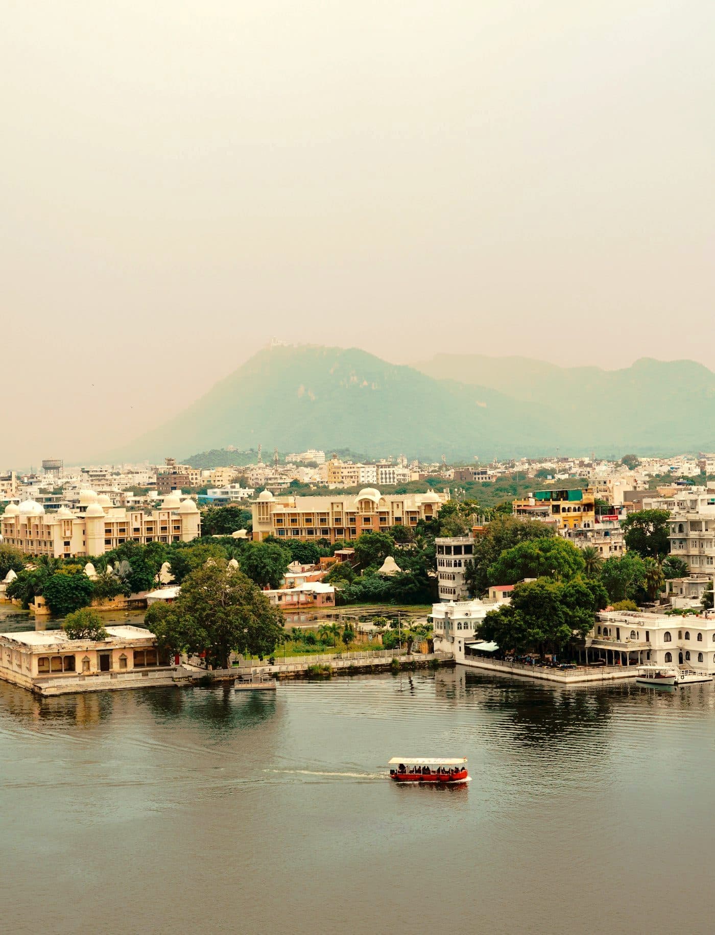 Fateh Sagar Lake with the city and the Aravallis behind it