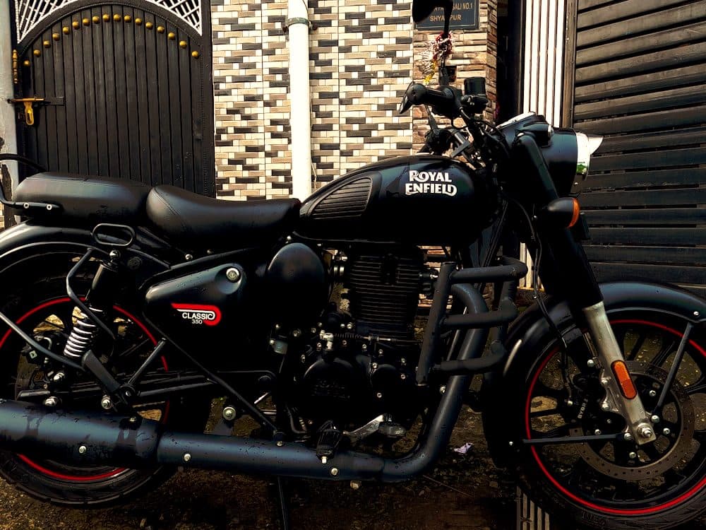 A motorcycle waiting on a back street